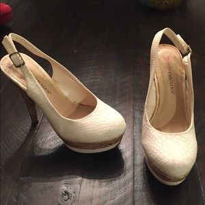 Cream snake-skin print platform heels